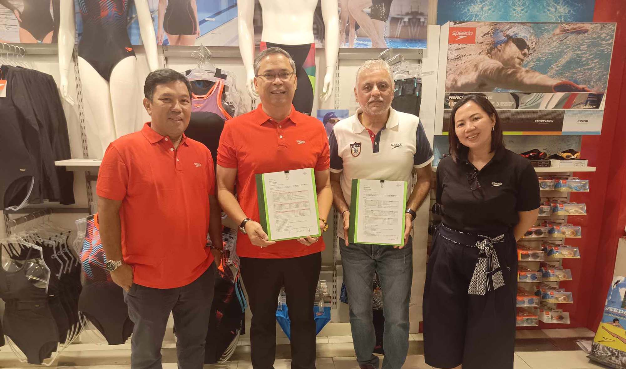 PAI Secretary General Batangas 1st District Congressman Eric Buhain (second from left) and Speedo Vice President-Operations Manish Mahtani proudly shows the signed contract for the partnership for the PAI National Trials Swimming Championship which started on Thursday (August 15). Also in photo are PAI executive Director Anthony Reyes and Speedo Sales and Marketing Manager Ms. Mayleen Valentino.